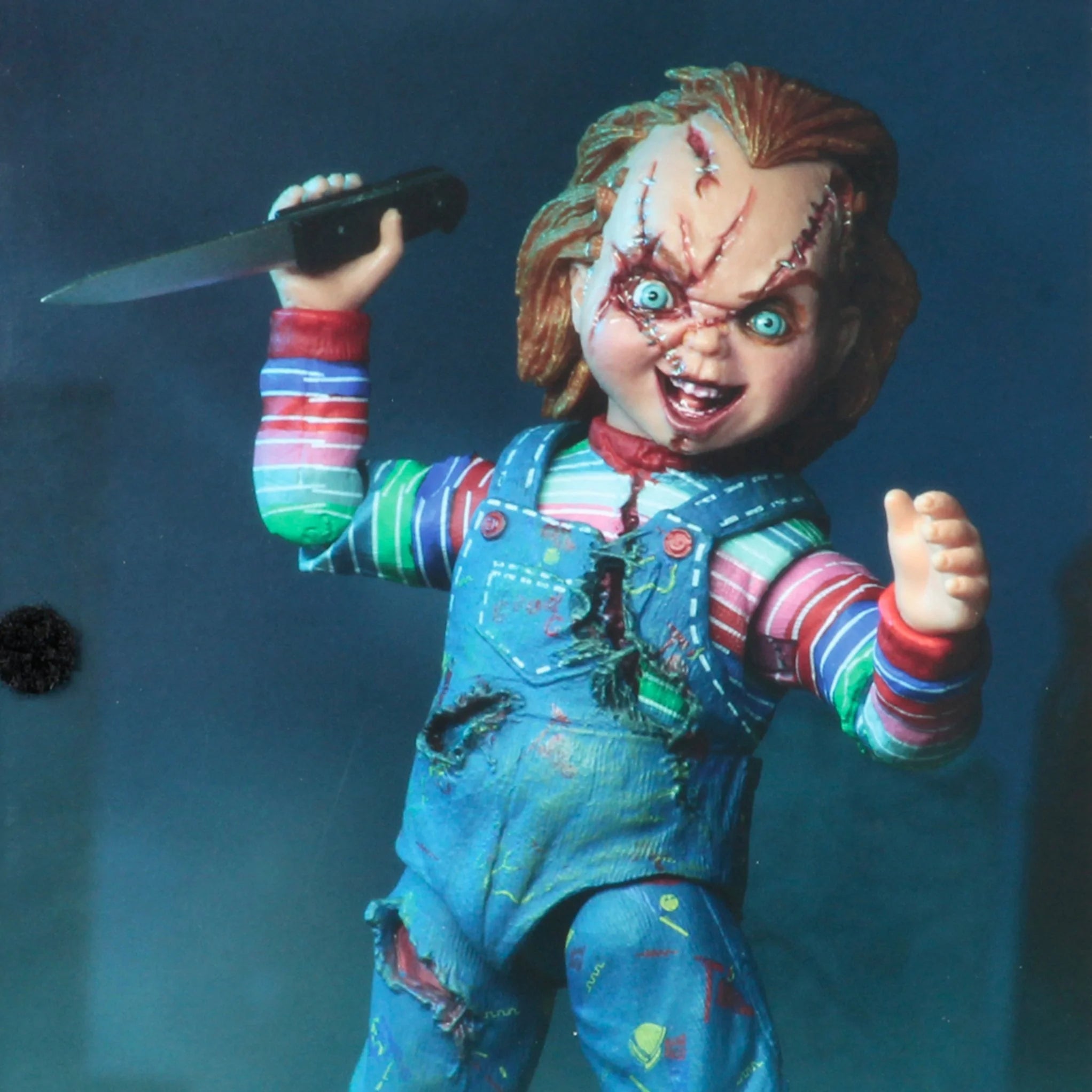 Bride of Chucky Ultimate Damaged Chucky Action Figure By NECA